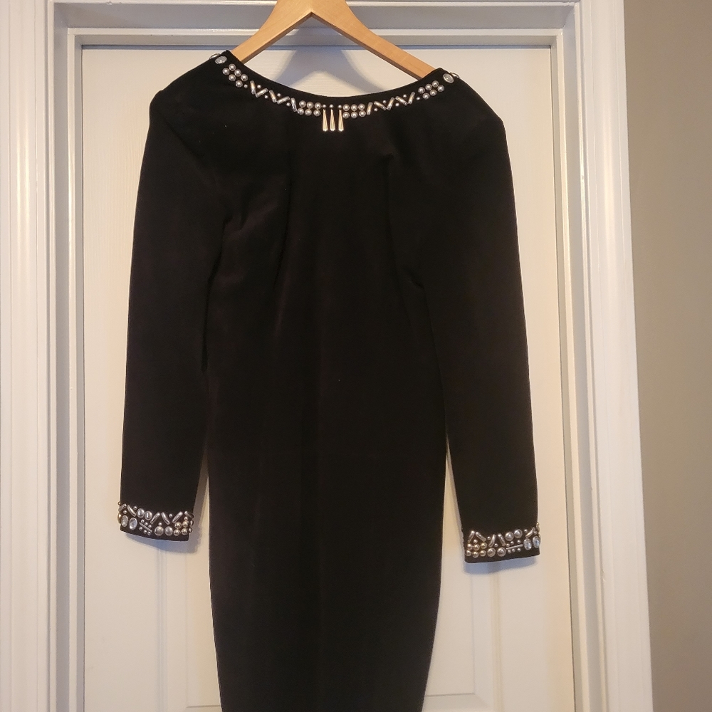 Beautifu vintage  100% suede dress with decorative studs. Deep drop in the back.
